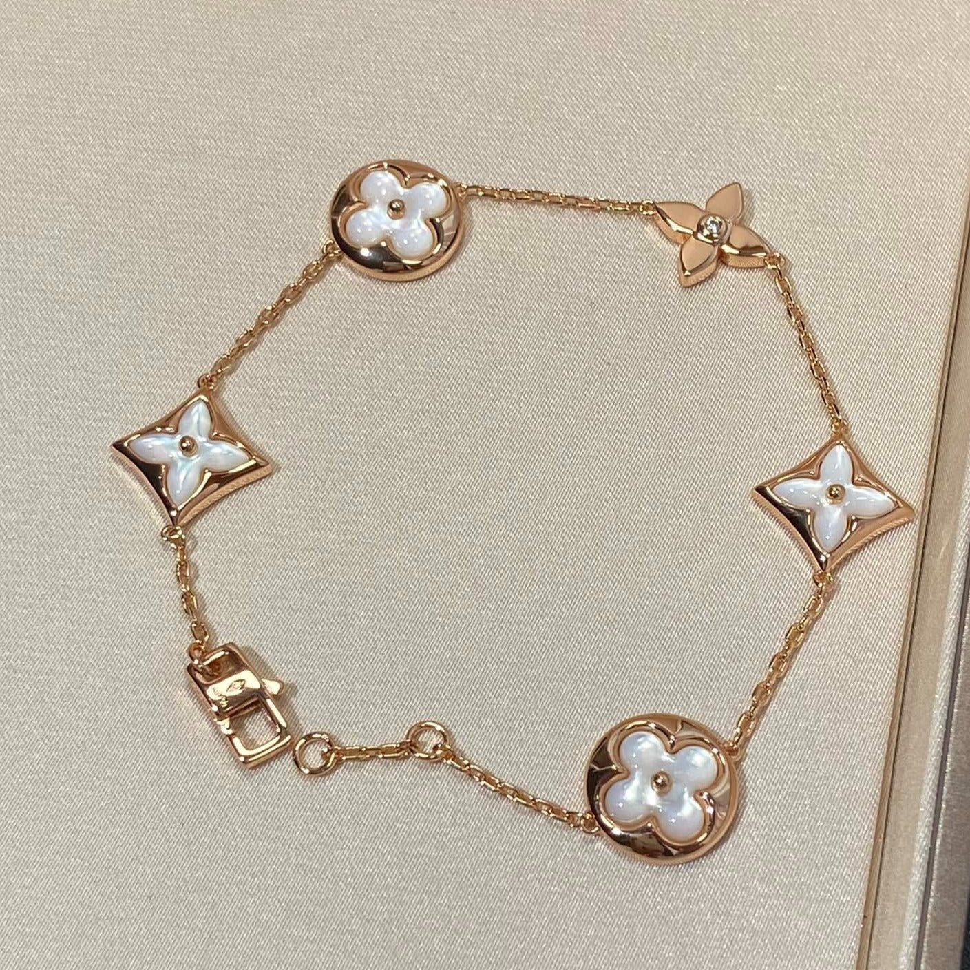 [Pearl Jewelrys]STAR AND SUN 5 MOTIF MOP PINK GOLD BRACELET