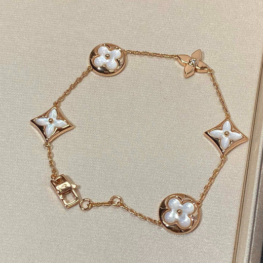 [Pearl Jewelrys]STAR AND SUN 5 MOTIF MOP PINK GOLD BRACELET