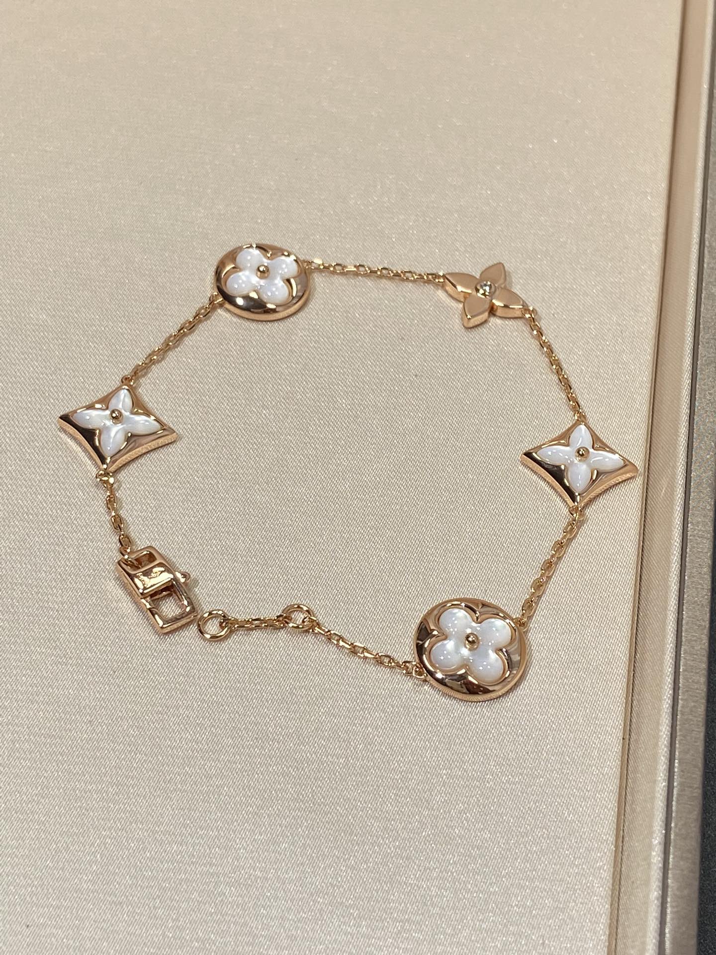 [Pearl Jewelrys]STAR AND SUN 5 MOTIF MOP PINK GOLD BRACELET