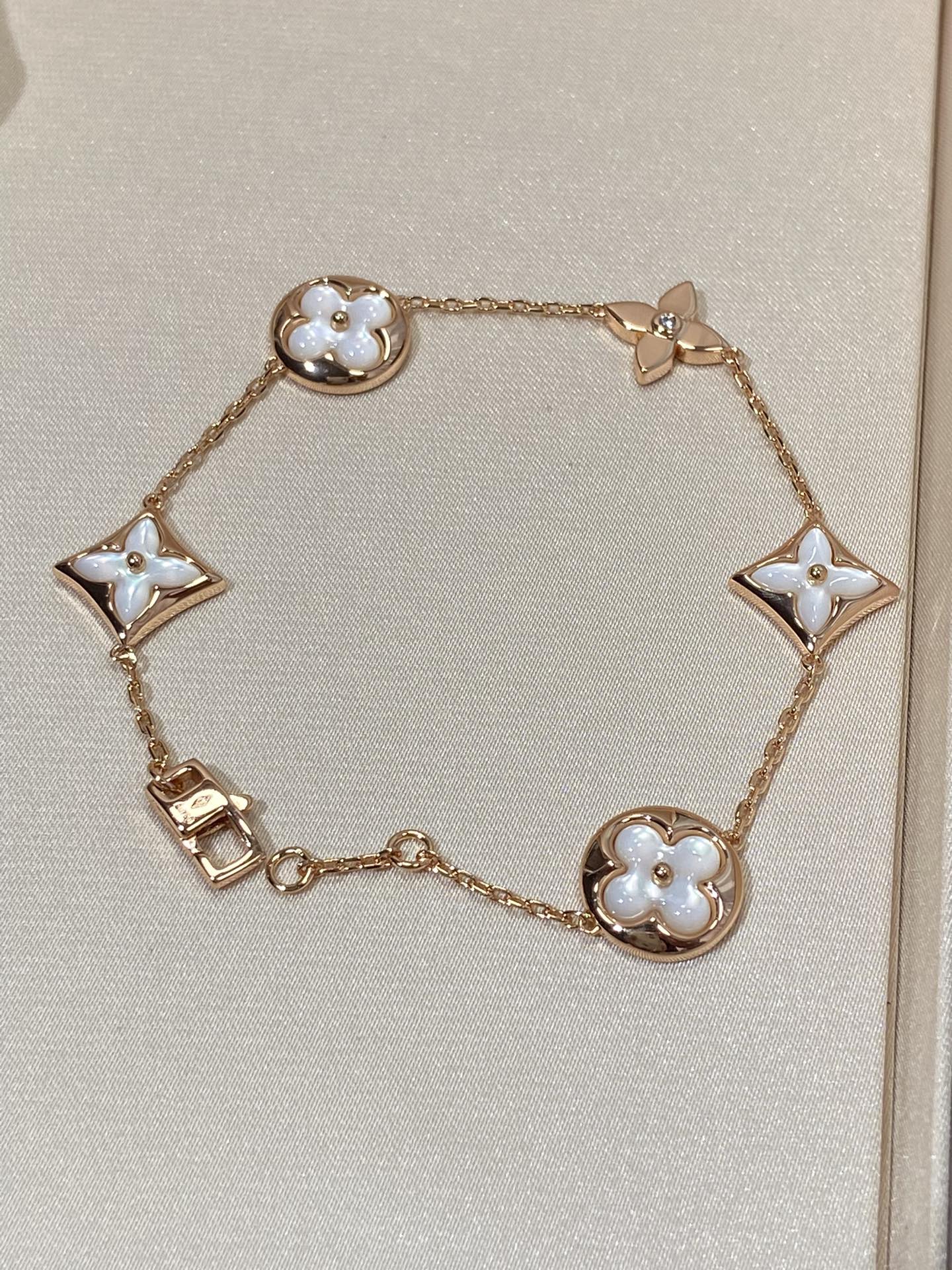 [Pearl Jewelrys]STAR AND SUN 5 MOTIF MOP PINK GOLD BRACELET