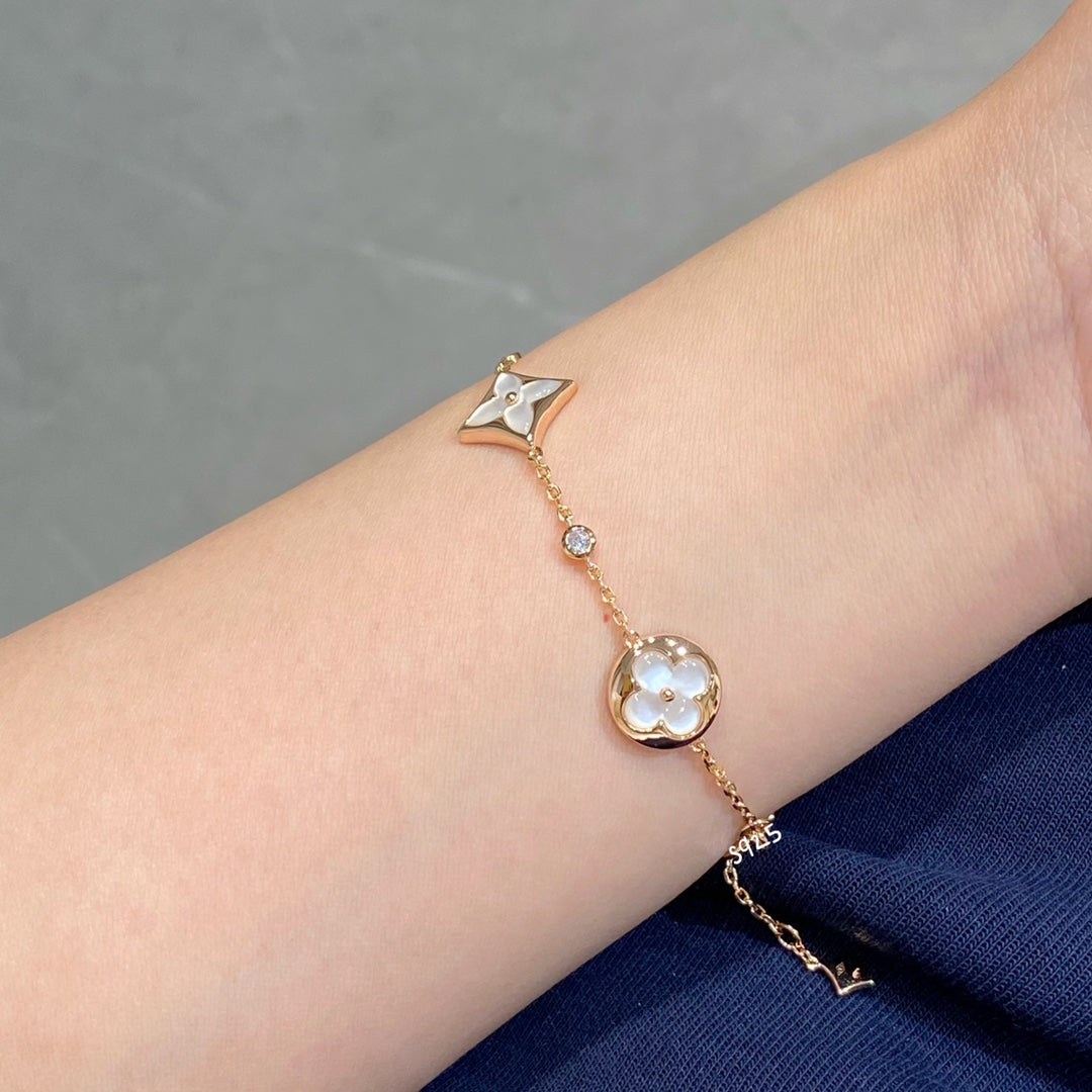 [Pearl Jewelrys]STAR AND SUN 4 MOTIF WHITE MOP PINK GOLD BRACELET